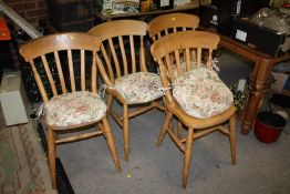 A PINE KITCHEN TABLE AND FOUR CHAIRS