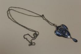 AN ART NOUVEAU SILVER AND ENAMEL PENDANT ON CHAIN