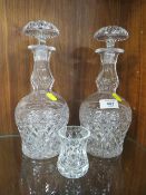 A PAIR OF CUT GLASS DECANTERS