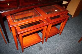 A MODERN SET OF THREE, NEST OF TABLES