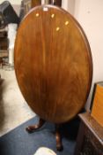A VICTORIAN MAHOGANY TILT-TOP TABLE