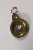 AN ANTIQUE BRASS MINERS POCKET WATCH CASE