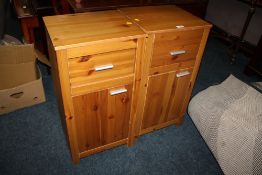 A PAIR OF MODERN PINE EFFECT BEDSIDE CABINETS