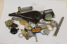 A BAG OF VINTAGE AND ANTIQUE COLLECTABLES TO INCLUDE WATCH PARTS, POWDER FLASK ETC.