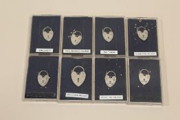 EIGHT SILVER HEART PADLOCKS