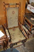 AN ANTIQUE AMERICAN ROCKING CHAIR A/F