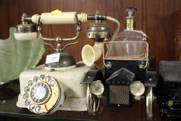 A VINTAGE TELEPHONE TOGETHER WITH A NOVELTY VINTAGE CAR SHAPED DRINKING GLASS SET AND ANOTHER (3)