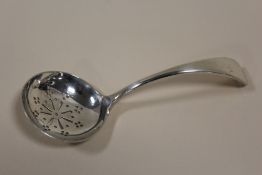 A HALLMARKED SILVER SIFTER SPOON