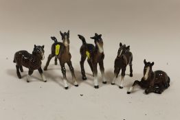 A COLLECTION OF MOSTLY BESWICK FOAL FIGURES (SOME A/F) (5)