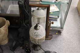 A SWING MIRROR TOGETHER WITH A LAMP AND EBONISED RACKING (3)