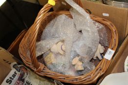 A BASKET OF PIGGIN FIGURES