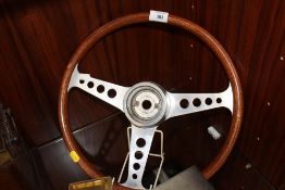 A VINTAGE WOODEN CAR STEERING WHEEL, STAMPED 'LL'