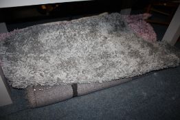 FOUR ASSORTED MODERN WOOLLEN RUGS