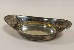 A HALLMARKED SILVER BREAD DISH