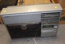 A SHARP VZ3510 VERTICAL RECORD PLAYER MUSIC CENTER