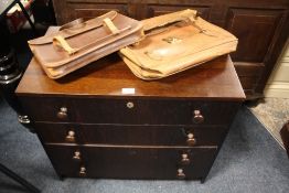 A MODERN FOUR DRAWER CHEST OF DRAWERS TOGETHER WITH 2 VINTAGE SATCHELS