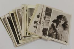 A COLLECTION OF BLACK AND WHITE POSTCARDS