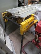 A DEWALT DW742 TABLE SAW