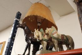 A RETRO CHALK TABLE LAMP IN THE FORM OF A HORSE TOGETHER WITH A ROYAL DUX FIGURE GROUP OF A PAIR