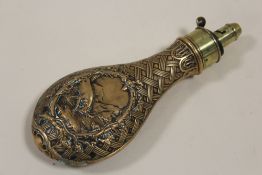 AN ANTIQUE COPPER AND BRASS POWDER FLASK