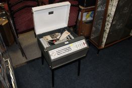 A RETRO VINTAGE DANSETTE RG65 RECORD PLAYER ON LEGS
