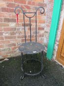 A CAST METAL GOTHIC STYLE CHAIR