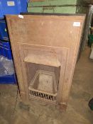 A CAST METAL ANTIQUE FIREPLACE