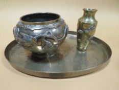 A BRONZE EFFECT ORIENTAL VASE WITH BIRD DETAIL TOGETHER WITH A SMALL BRASS FLORAL VASE AND A BRASS