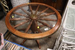 A RETRO SHIPS WHEEL GLASS COFFEE TABLE DIA. 76CM