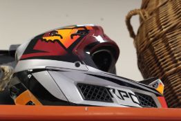 A BOXED RPC MOTORCYCLE HELMET