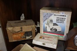 A BOXED HANIMEX SLIDE PROJECTOR, A BOXED DUSTETTE HOOVER, VINTAGE FIRST AID KIT ETC.