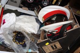 A QUANTITY OF MILITARY CLOTHING ACCESSORIES TO INCLUDE OFFICERS CAPS, NAZI STYLE BELT ETC.