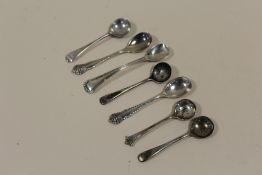 A BAG OF HALLMARKED SILVER CONDIMENT SPOONS
