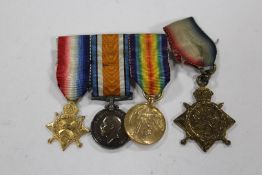 A GROUP OF THREE WWI MINIATURE MEDALS AND A MINIATURE MONS STAR (4)