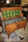 AN OAK MARBLE TOPPED ARTS AND CRAFTS WASHSTAND W-107 CM
