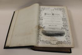 A LARGE ANTIQUE HOLY BIBLE