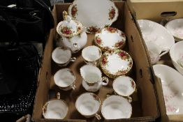 A ROYAL ALBERT OLD COUNTRY ROSES CHINA SIX PERSON TEA SET Condition Report:The teapot has a chip