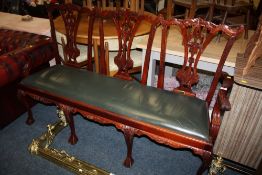 A MODERN CHIPPENDALE STYLE CARVED THREE SEATER BENCH / SOFA - W 164 CM