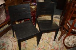 A PAIR OF MODERN DINING CHAIRS