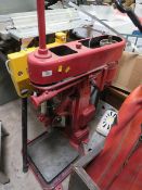 A LARGE RED 'CORONA' PILLAR DRILL