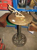 A CAST METAL SUNDIAL WITH GILDED TOP