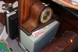 A VINTAGE OAK NAPOLEON HAT MANTEL CLOCK TOGETHER WITH A HEURTIER P6-24 PROJECTOR