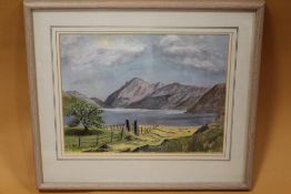 A FRAMED AND GLAZED WATERCOLOUR OF A MOUNTAINOUS LAKE SCENE SIGNED MURIEL DEXTER