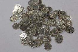 A QUANTITY OF SILVER THREE PENNY COINS
