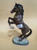 A BESWICK 1014 REARING HORSE FIGURE A/F
