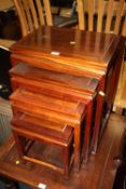 A CHINESE STYLE NEST OF FOUR TABLES