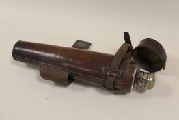 A VINTAGE LEATHER CASED CONICAL HUNTING FLASK