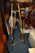 A BRASS EFFECT EASEL, H 153 CM