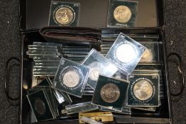 A TIN OF ASSORTED CASED COINS