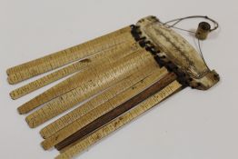 A VINTAGE FOLK ART / TRIBAL BAMBOO AND BONE ADORNMENT / PENDANT